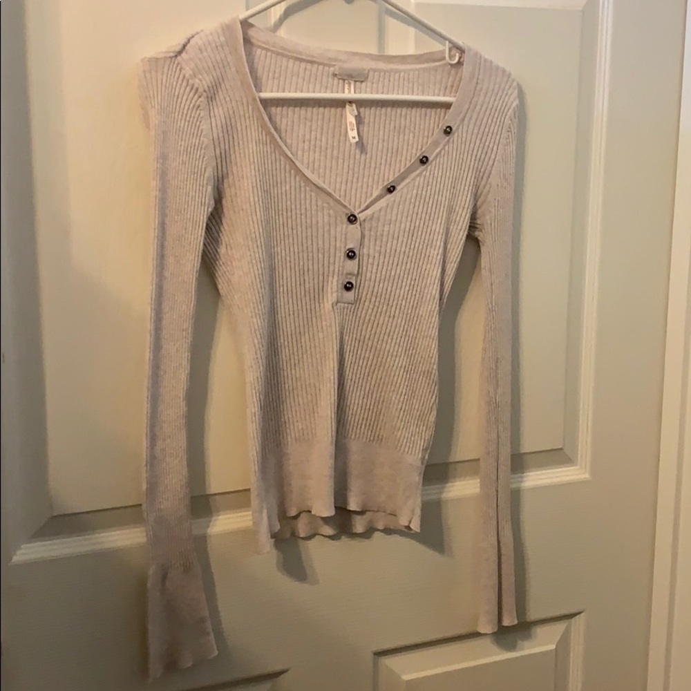beige long sleeve shirt